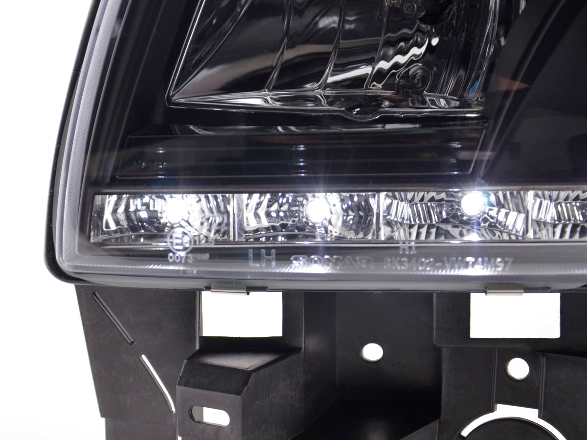 Scheinwerfer Set Daylight LED TFL-Optik VW Bus Typ T4 96-03 schwarz Scheinwerfer Set Daylight LED TFL-Optik VW Bus Typ T4 96-03 schwarz